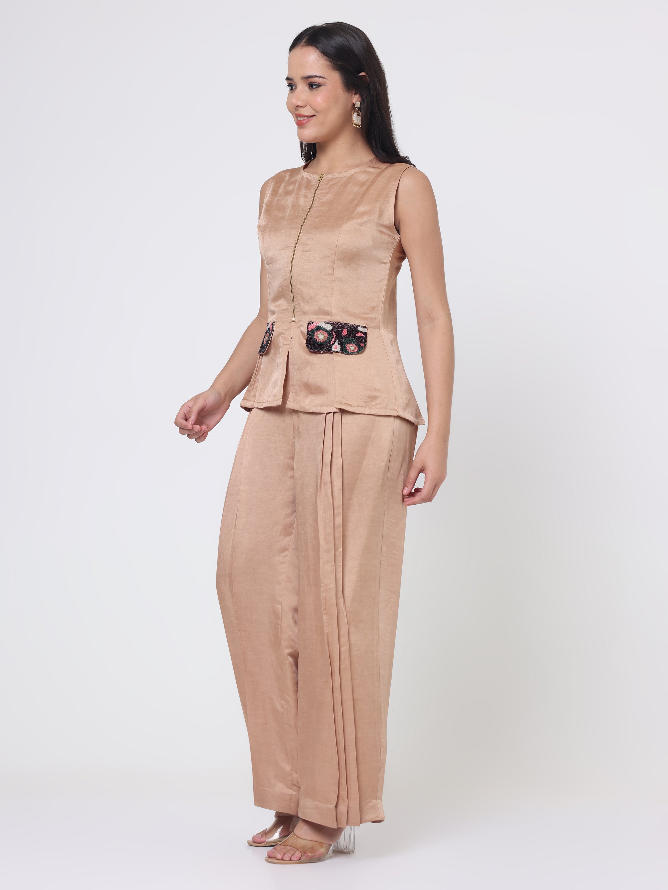 Coord set with embroidered pocket patch detailing and pleated flared pants