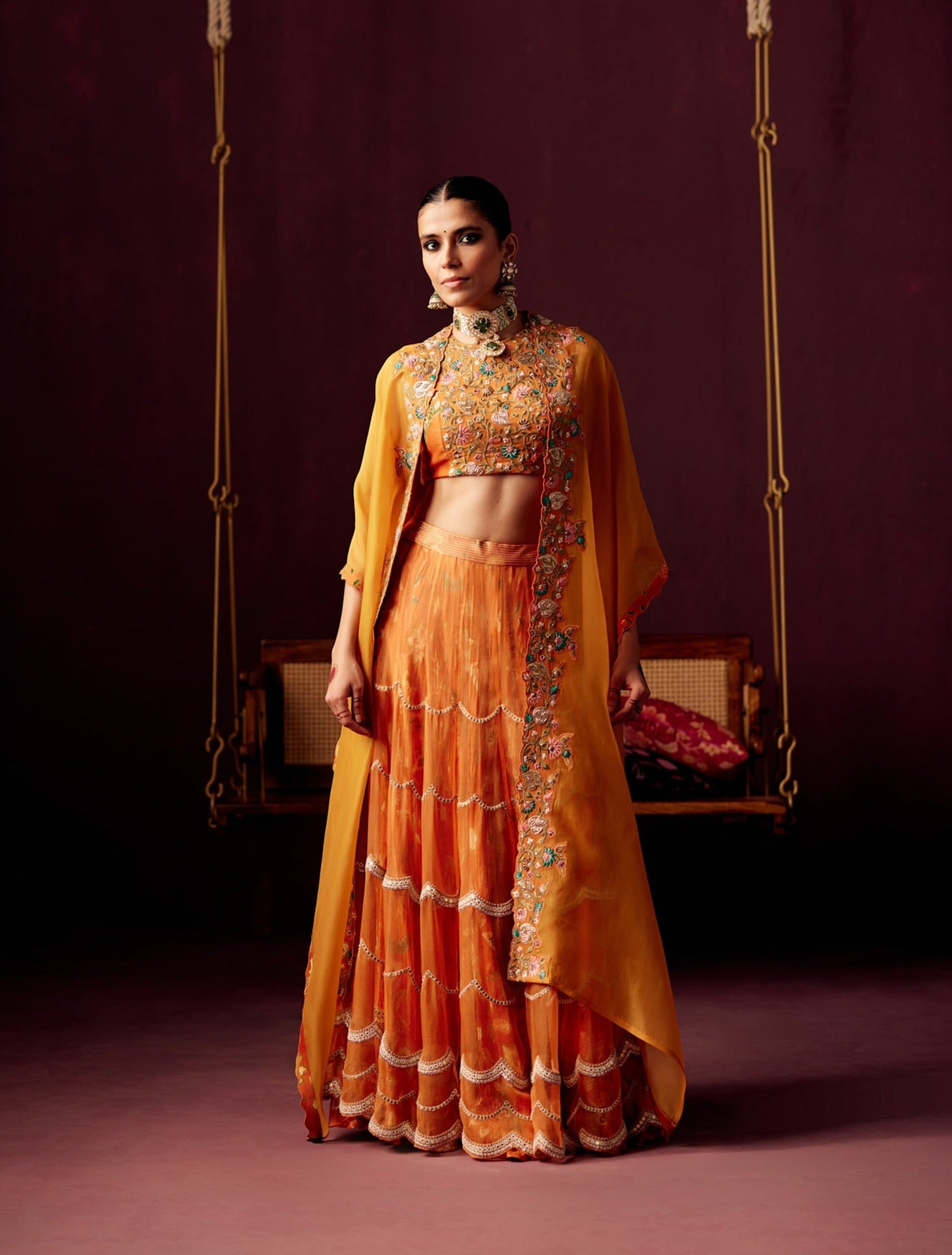 Burnt Orange Layered Lehenga with Bustier & Drape Cape