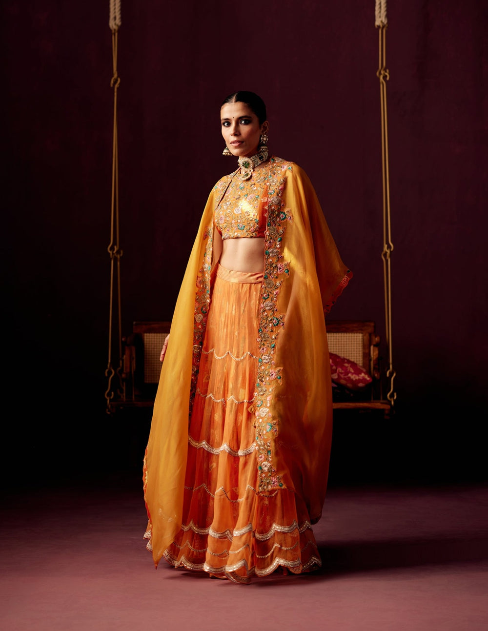 Burnt Orange Layered Lehenga with Bustier & Drape Cape