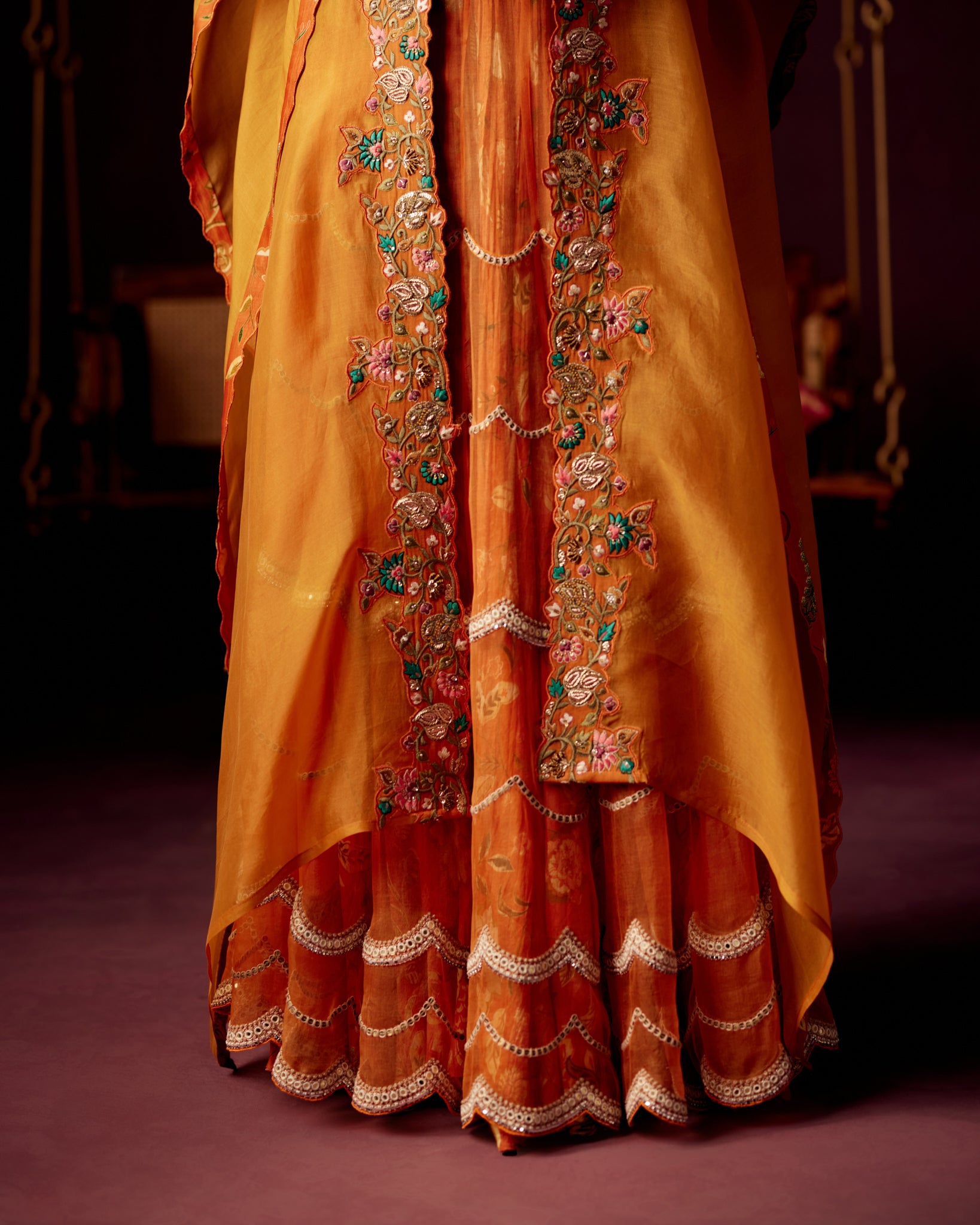 Burnt Orange Layered Lehenga with Bustier & Drape Cape